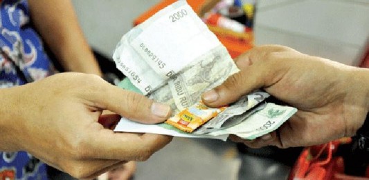 Uang Kembalian Pakai Permen, Pedagang Terancam Pidana