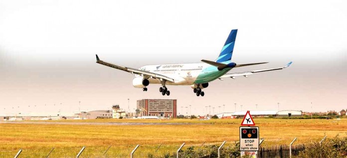 GARUDA_INDONESIA_AIRBUS_A330-300_PK-GPA_IN_LIVERPOOL_FC_ONBOARD_MARKINGS_LANDING_RUNWAY_27_AT_LIVERPOOL_JOHN_LENNON_AIRPORT_JULY