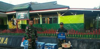 Satgas Yonif 144/JY Sita Puluhan Dus Minuman Beralkohol