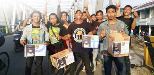 Bantu Korban Gempa Aceh, Slanker Sambas Turun ke Jalan