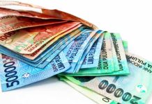 Duit Bukan Rupiah Mulai Berpindah-pindah Tangan