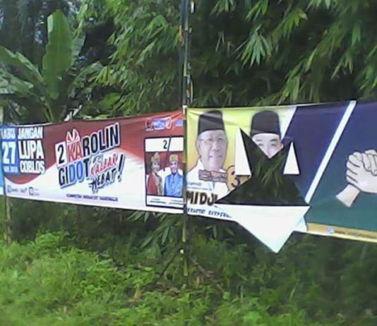 Baliho Yansen-Ason dan Midji-Norsan Dirusak Baliho pasangan Cagub Kalbar, Sutarmidji-Ria Norsan yang dirusak