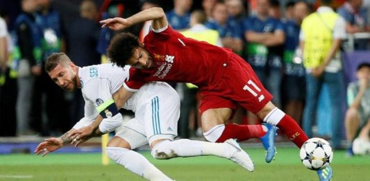 Insya Allah Aku Lilo, Madrid BENCANA UNTUK SETAN MERAH. Mohamed Salah (Liverpool) ketika dijatuhkan Sergio Ramos (Real Madrid) di Final Liga Champions 2018.