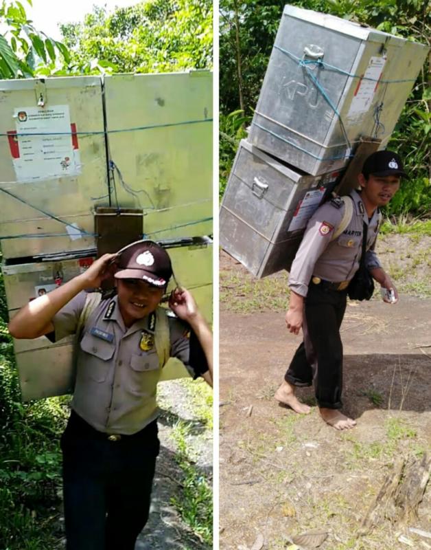 DAPAT PENGHARGAAN. Brigadir Palentinus dan Brigadir Marten Sumantri ketika berjalan kaki tiga jam sambil memikul kotak suara di Kecamatan Ambalau, Sintang, belum lama ini. Warganet for RK