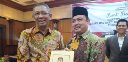 Tepung Tawar Sambut Duet Pemimpin Kalbar 2018-2023 PEMIMPIN KALBAR BARU. Sutarmidji-Ria Norsan menerima penetapan sebagai Paslon Gubernur dan Wakil Gubernur Kalbar terpilih periode 2018-2023 di Ballroom Hotel Kapuas Palace, Pontianak, Selasa (24/7). Rizka Nanda-RK