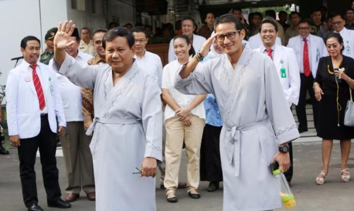 TES KESEHATAN. Bakal Capres dan Cawapres 2019, Prabowo Subianto dan Sandiaga Uno, usai tes kesehatan di RSPAD Jakarta, Senin (13/8). Miftahulhayat-Jawa Pos