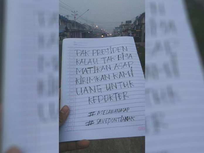 PESAN BUAT JOKOWI. Kabut asap semakin tebal, warga Kota Pontianak sindir pemerintah yang tak bisa mengendalikan karhutla, kemarin. Warganet for RK