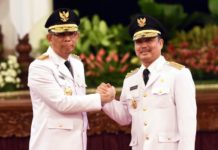 Midji Optimis Mampu Dongkrak IPM Kalbar KOMPAK. Sutarmidji-Ria Norsan melakukan salam komando usai dilantik Presiden sebagai Gubernur dan Wakil Gubernur Kalbar di Istana Negara, Jakarta, Rabu (5/9).