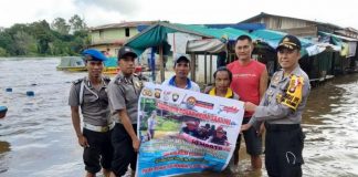 Hujan Deras, Kapolsek Serawai Minta Warga Waspada Banjir