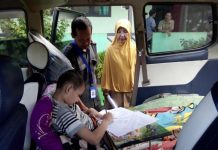 Kerjakan Soal UASBN di Mobil