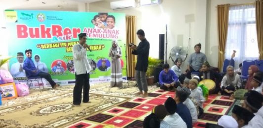 Berbagi dan Buka Puasa Bersama Anak Pemulung